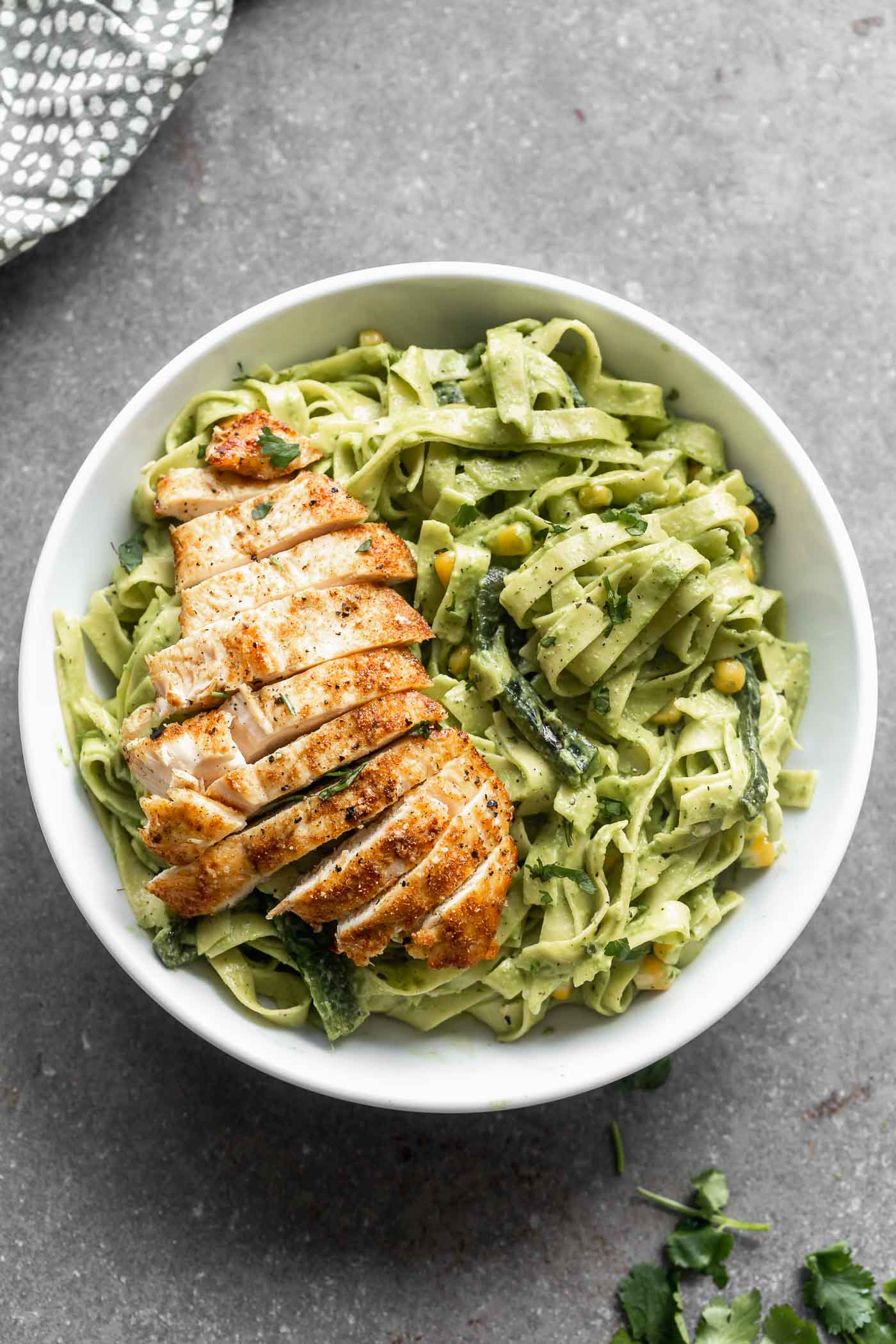 Creamy Roasted Poblano Pasta: Silky strands of tagliatelle pasta twirled in a smoky, spicy, DELICIOUS Poblano Cream Sauce. There's also hints of cilantro and garlic - yum! Perfect for date night, Friday night, or really, any night.