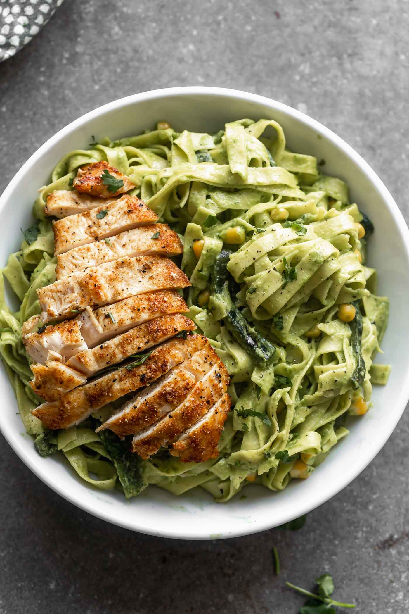 Creamy Roasted Poblano Pasta: Silky strands of tagliatelle pasta twirled in a smoky, spicy, DELICIOUS Poblano Cream Sauce. There's also hints of cilantro and garlic - yum! Perfect for date night, Friday night, or really, any night.