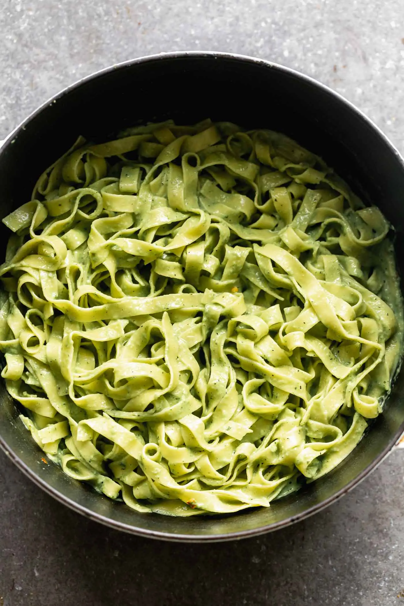 Creamy Roasted Poblano Pasta: Silky strands of tagliatelle pasta twirled in a smoky, spicy, DELICIOUS Poblano Cream Sauce. There's also hints of cilantro and garlic - yum! Perfect for date night, Friday night, or really, any night.