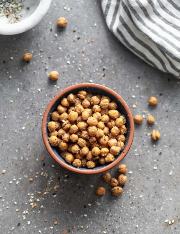 Crispy Everything Bagel Chickpeas are the perfect snack! They're covered in ground up everything bagel seasoning, tossed with olive oil and baked until golden brown and crispy. Store them in an airtight container and pull them out whenever you feel the need to snack!