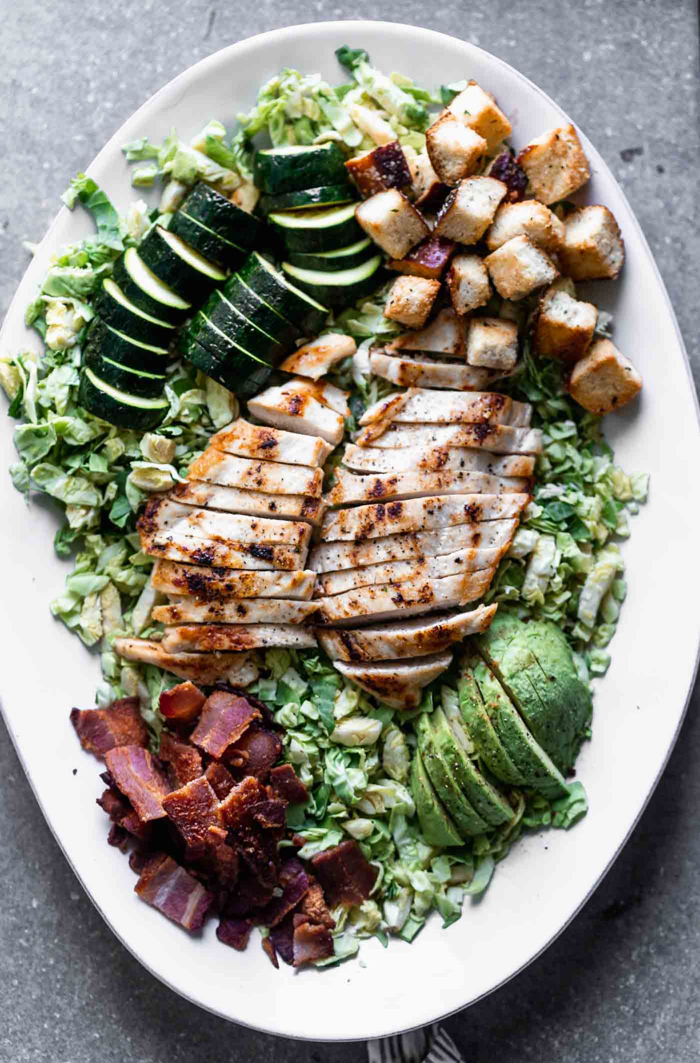 Green Goddess Brussels Sprout Salad with Bacon and Grilled Chicken