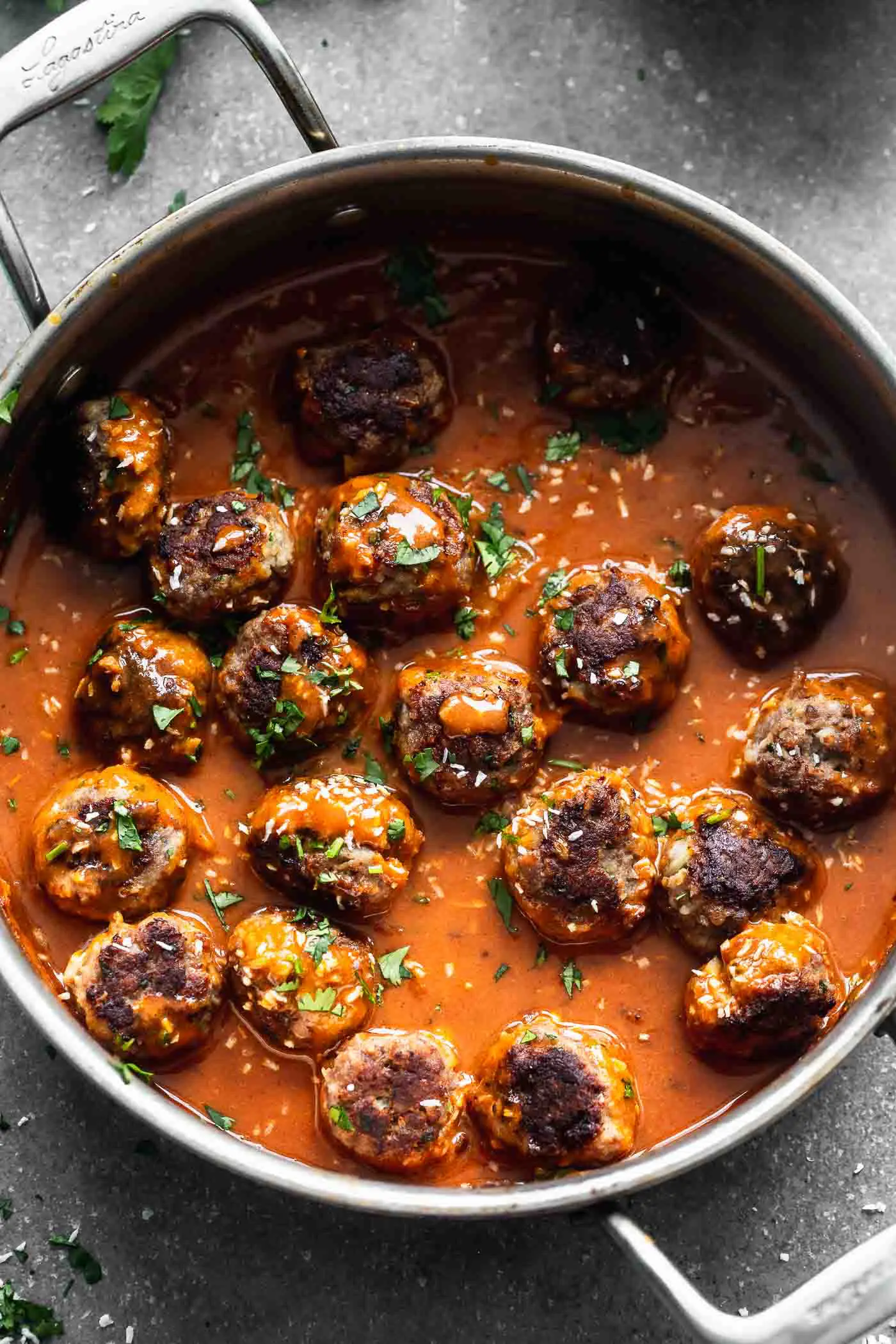 These Coconut Curry Meatballs require minimal ingredients, but have SO much flavor. They're packed with garlic, ginger, onion and cilantro, browned until crisp, and bathed in a luscious coconut curry sauce. Only 30 minutes from start to finish! 