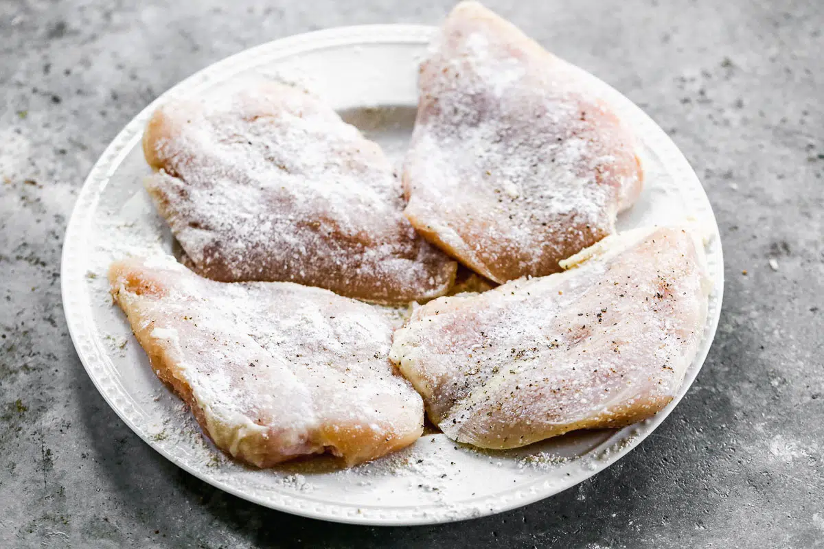 Chicken breasts dredged in flour