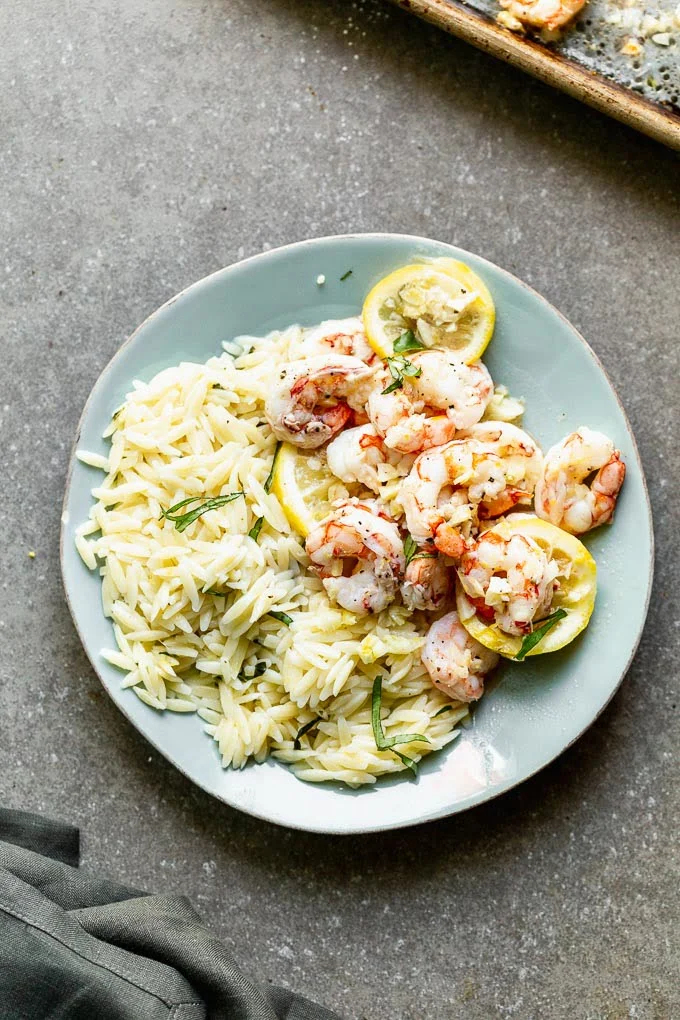 Serve with lemony orzo sprinkled with basil. 