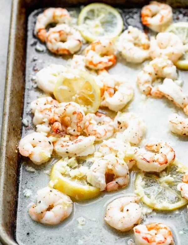 Baked Lemon Shrimp has only FIVE ingredients, and is packed with lemon, garlic, and buttery goodness. Such an easy weeknight meal!