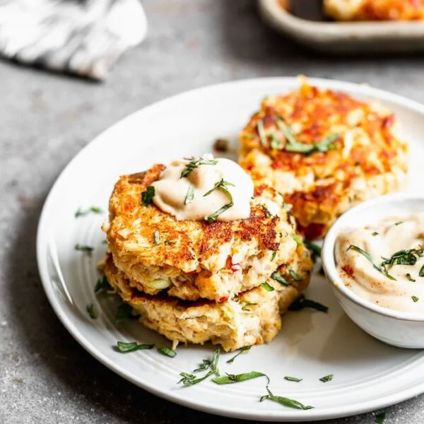 This lump crab cake recipe is easy to make, uses barely any filler, is PACKED with lump crab meat, and SO delicious! We kept to tradition with a little bit of old bay seasoning, but also added in plenty of lemon juice, zippy dijon mustard, and hot sauce for a little kick.  