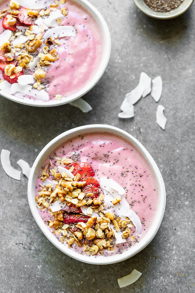 Strawberry Smoothie Bowls with Walnut Crumble –&nbsp;a healthy, filling, and delicious way to start your day. These are easy to throw together on busy mornings, and most importantly, fun for kids and parents to eat.&nbsp;They're packed with frozen strawberries, bananas, flax, and walnut milk and then topped with any easy oat and walnut mixture.