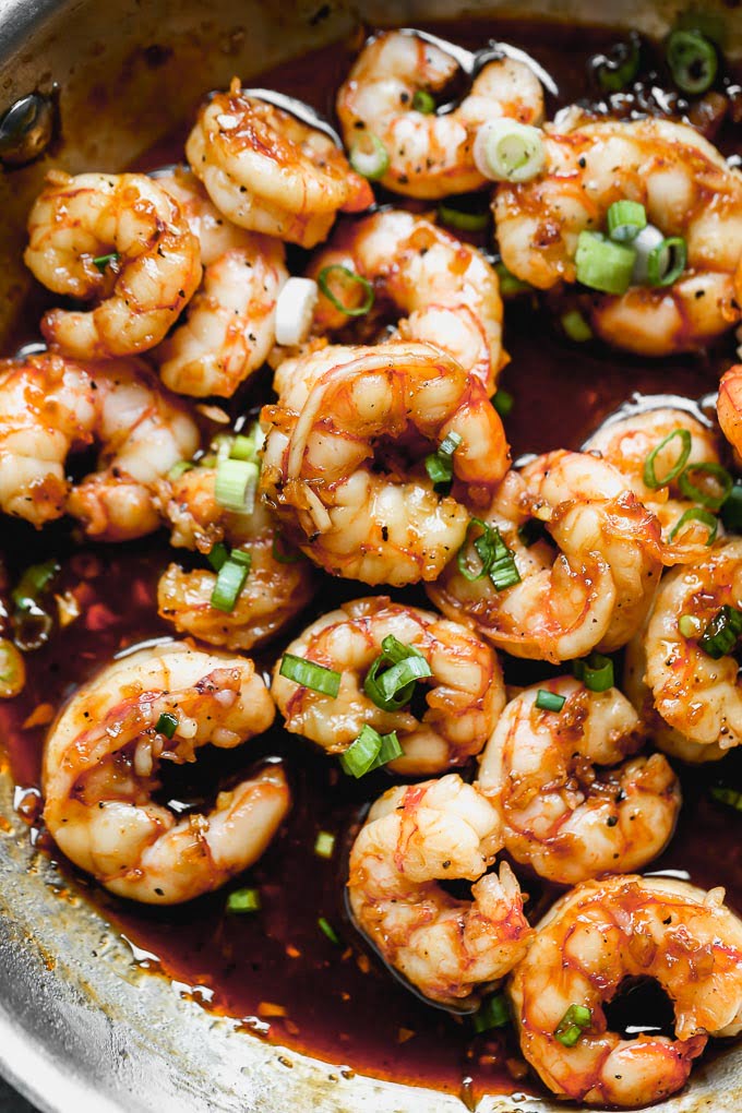 sprinkle caramel shrimp with green onions