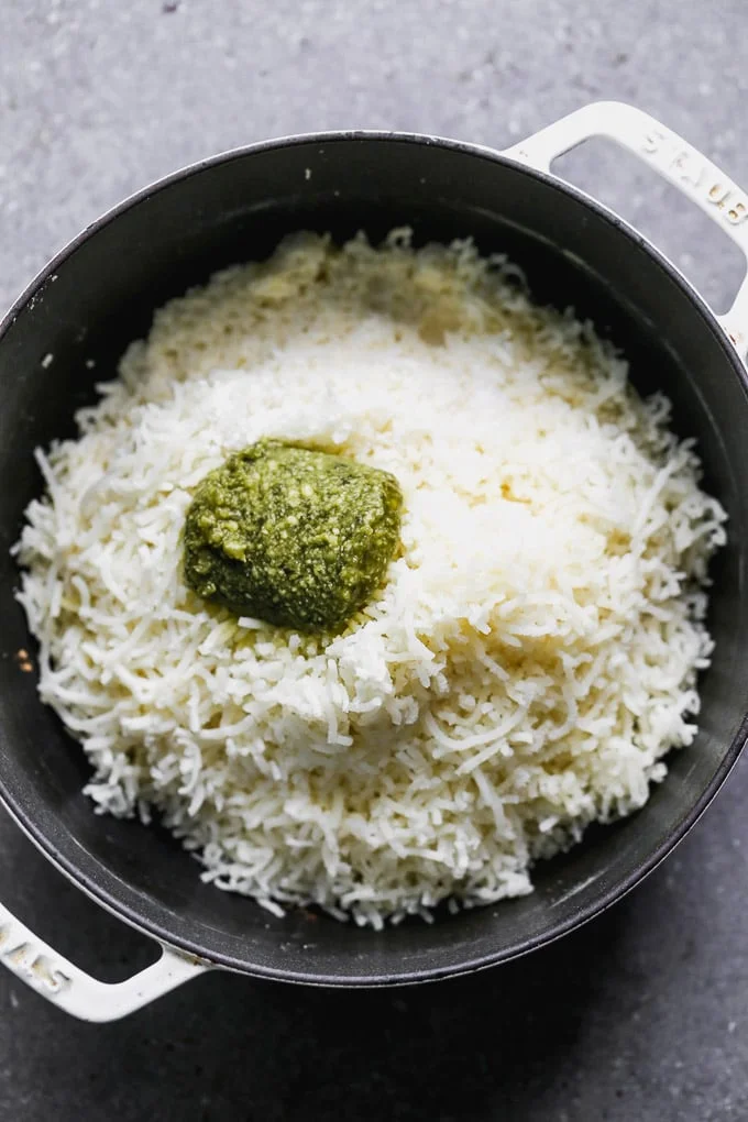 Add pesto, cream, and salt to the riced potatoes
