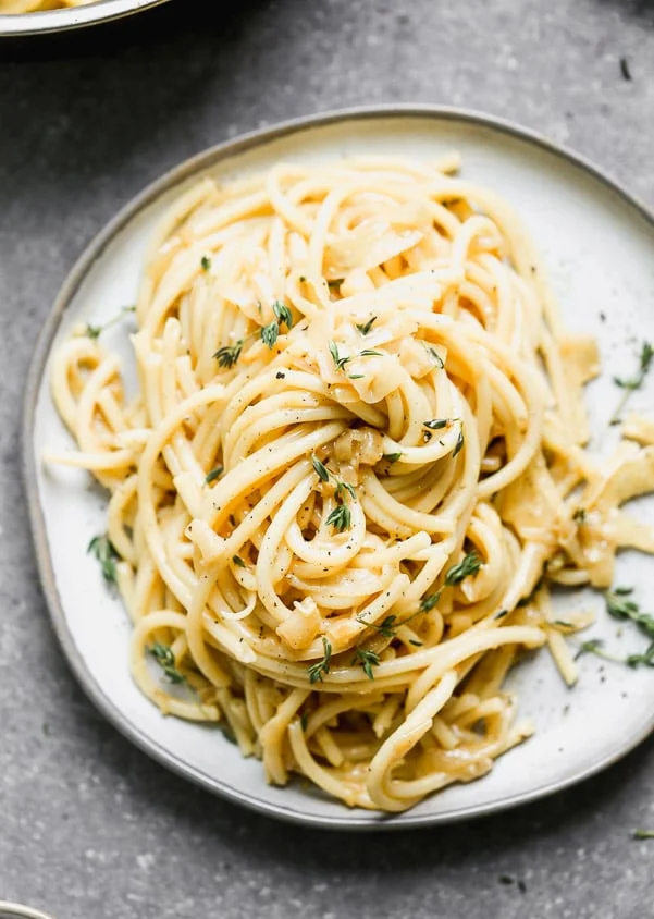 French Onion Pasta is French onion soup meets spaghetti carbonara. It's creamy, cheesy, and packed with sweet caramelized onion flavor.&nbsp;