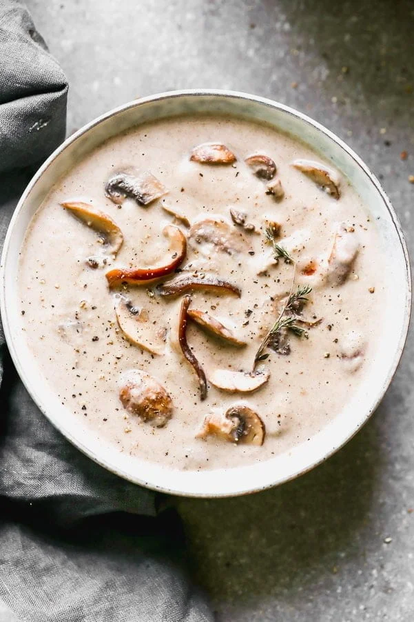  If you could dream up the most luxurious, creamy, hearty soup, it would be this Cream of Mushroom Soup. This creamy mushroom soup is packed with two different kinds of mushrooms, lots of dry sherry, garlic, and just a hint of fresh thyme. Delicious and oh-so dreamy.