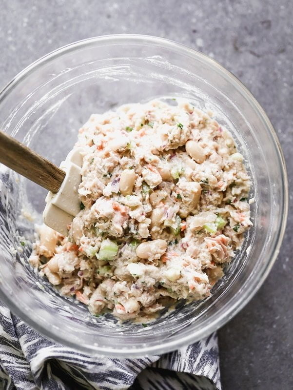 Gently mix ingredients in the Tuna White Bean Salad until combined. 