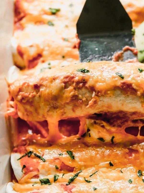 Cheese pull chicken enchiladas 