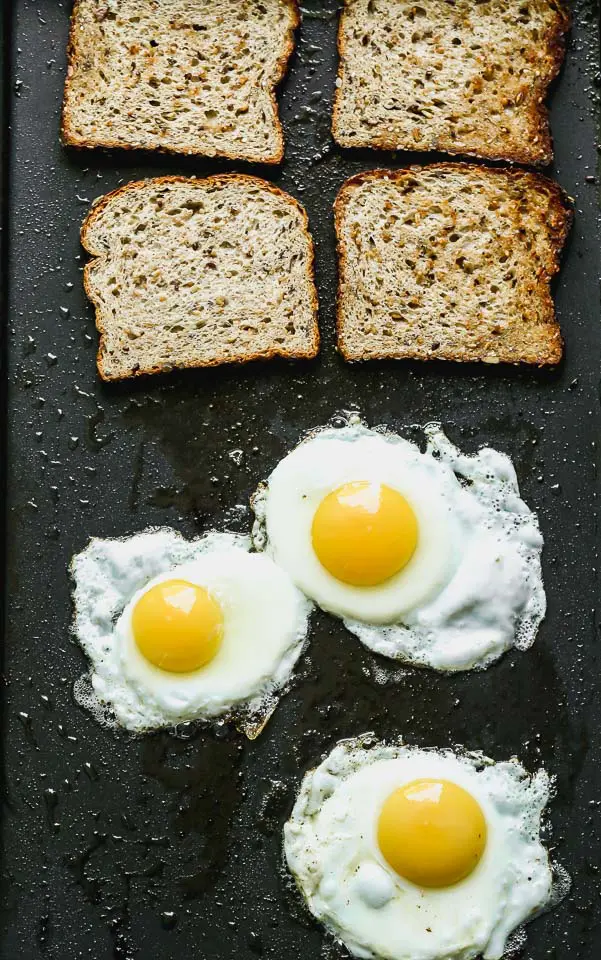 Bread toasting and eggs frying