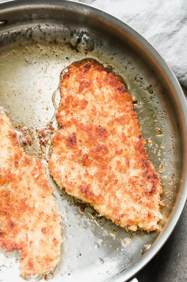 Cook chicken cutlets in butter and olive oil until golden brown