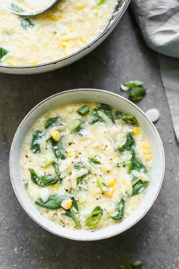 This Easy Vegetable Egg Drop Soup takes a simple classic to hearty new level. We amp up classic egg drop soup with lots of sweet corn, hearty spinach, and orzo noodles to transform this side soup into a dinner-worthy meal.
