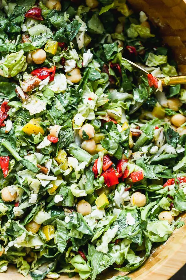 Easy Chopped Salad with tons of veggies, chickpeas, and an easy tahini vinaigrette. 
