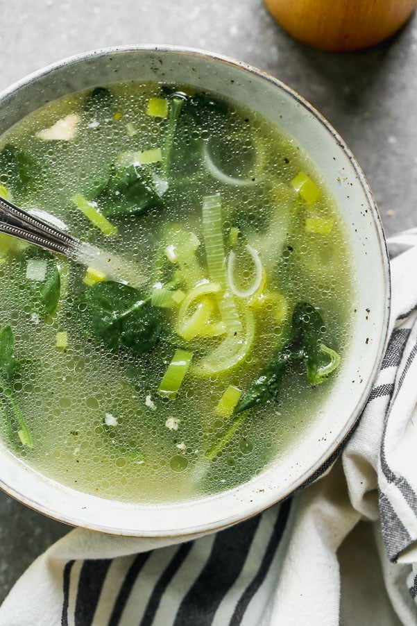 Our Detox Soup Recipe is the perfect way to jump-start your health after an indulgent weekend. We simmer chicken bones with tons of veggies, garlic, ginger, and lemongrass until the water turns into a deep, rich broth. Serve the broth with leeks, spinach and any of your other favorite veggies.