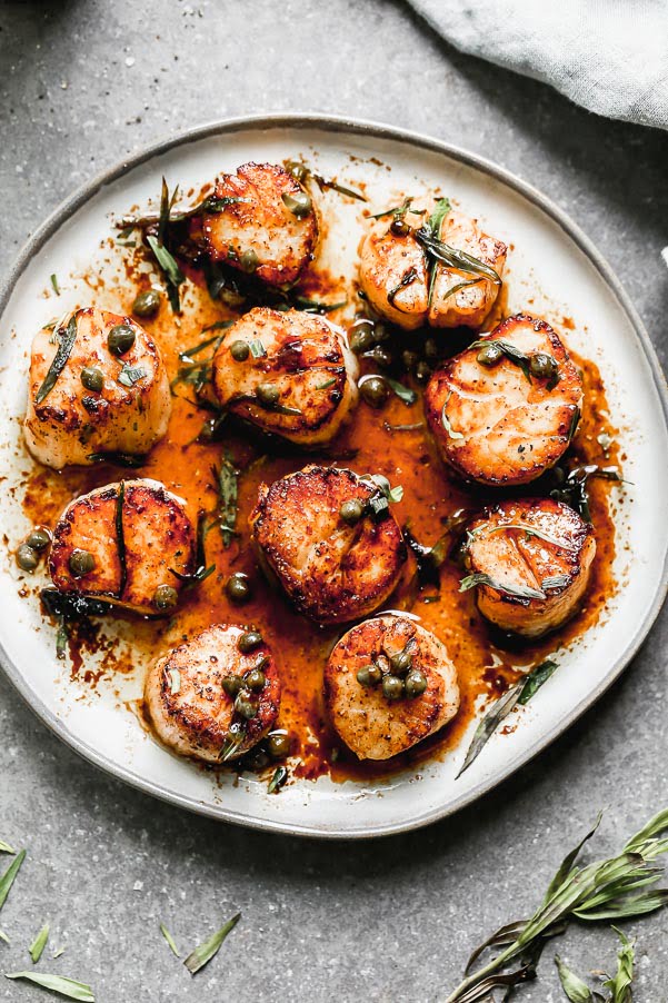 If you're a fan of scallops, then trust me, you NEED to make these Brown Butter Scallops with Tarragon. They are seared in nutty brown butter until ultra crispy, and then bathed in the same brown butter plus lots of lemon juice and plenty of tarragon. &nbsp;Even better? You only need five simple ingredients to make this restaurant-quality meal.&nbsp;
