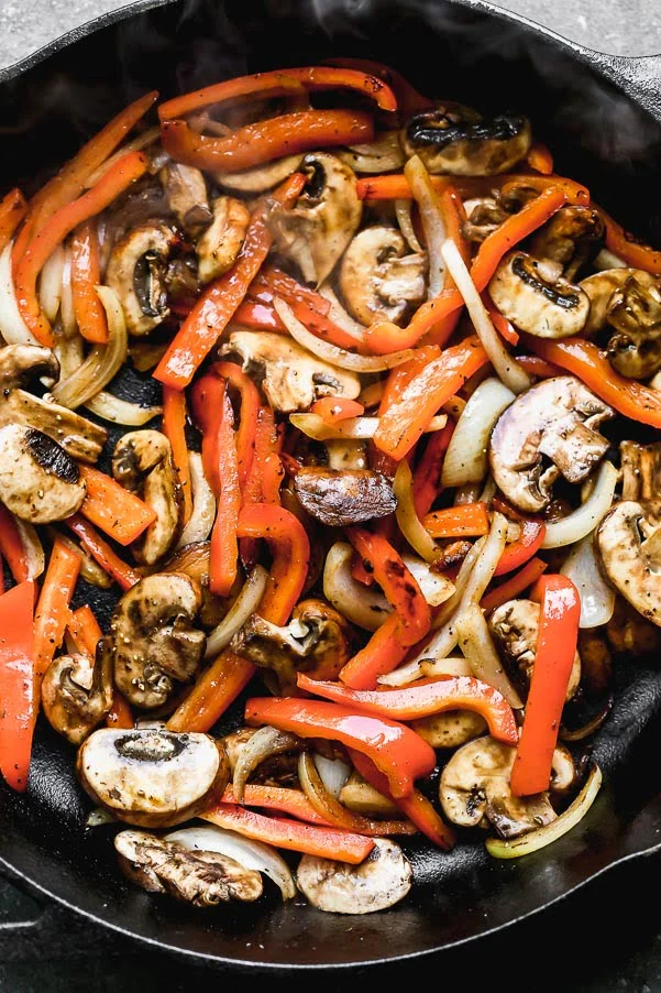 Portabello mushrooms, red peppers, and onions sautéed in coconut oil. 