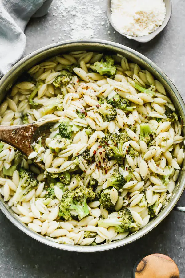 If you're into pasta that's ever-so-lightly coated in garlicky, spicy, slightly creamy, and totally cheese sauce, and then studded with crisp veggies, then you will be very into our Cavatelli and Broccoli. This super easy minimal-ingredient pasta is perfect for busy weeknights, and is also a great way to get your kiddos to eat their veggies.&nbsp;