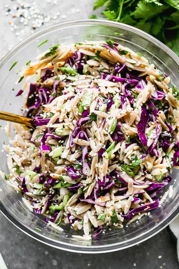 Our Cold Orzo Salad with Sesame is packed with whole-wheat orzo, a DELISH sesame lime vinaigrette, and loads of veggies. 25 minutes! 