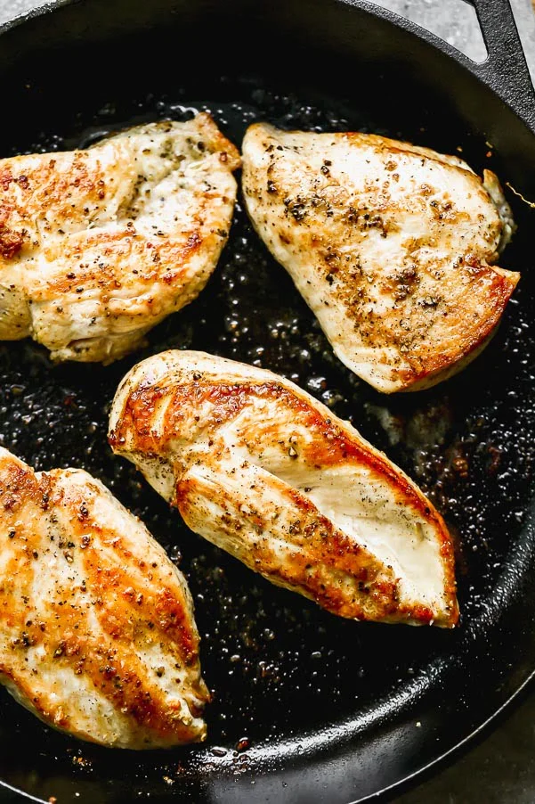 Sear chicken breasts in butter and olive oil