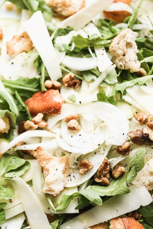 If you're looking for a way to step your salad game up, look no further than our Fennel and Apple Salad with Garlicky Croutons. We toss shaved fennel and Granny Smith apples with toasted walnuts, homemade sourdough croutons and shreds of parmesan cheese, and then drizzle it all in a simple lemon-y vinaigrette. 