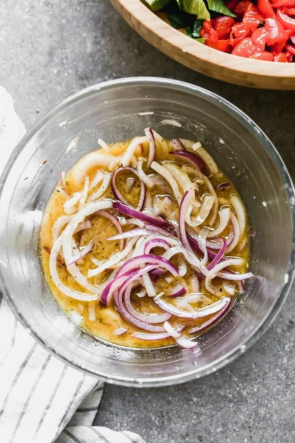 Marinate red onions in artichokes 