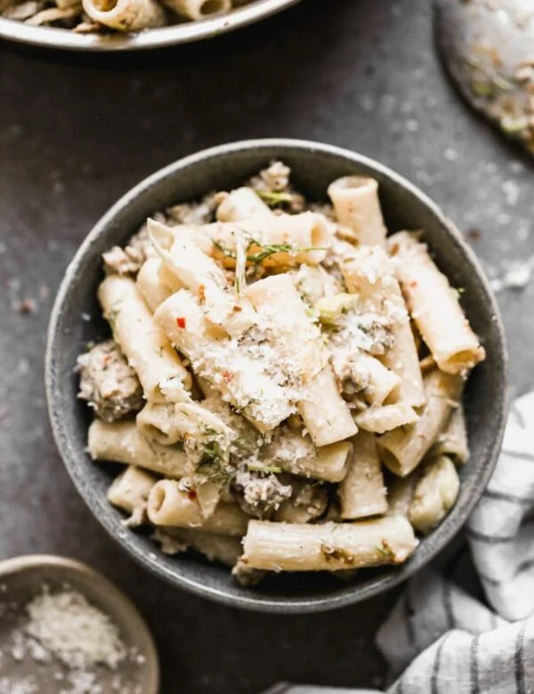 Pasta with Fennel and Sausage is spicy, sweet, creamy, and only six ingredients! Thanks to its minimal ingredient list and easy prep, this pasta is quick to throw together for a date-night in, or even a busy weeknight dinner.