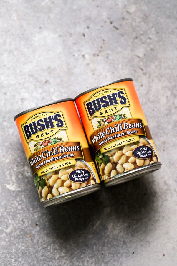 Cans of BUSH’S White Chili Beans.