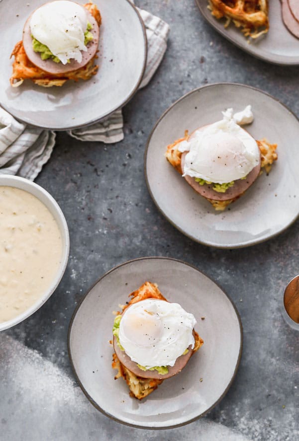 We have put a twist on everyone’s favorite brunch item – eggs benedict! Our Green Chile Avocado Eggs Benedict swaps out an English muffin for a cheesy, crispy hash brown waffle base. We top it with citrusy smashed avocado, hickory-smoked Canadian Bacon and a cheesy green chile-infused mornay sauce. Brunch heaven!