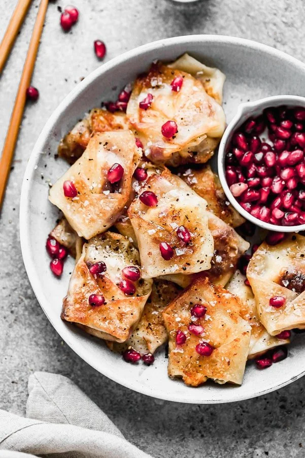 Crispy Pomegranate and Brie Potstickers! This fun twist on a classic is perfect for entertaining and only five ingredients! 