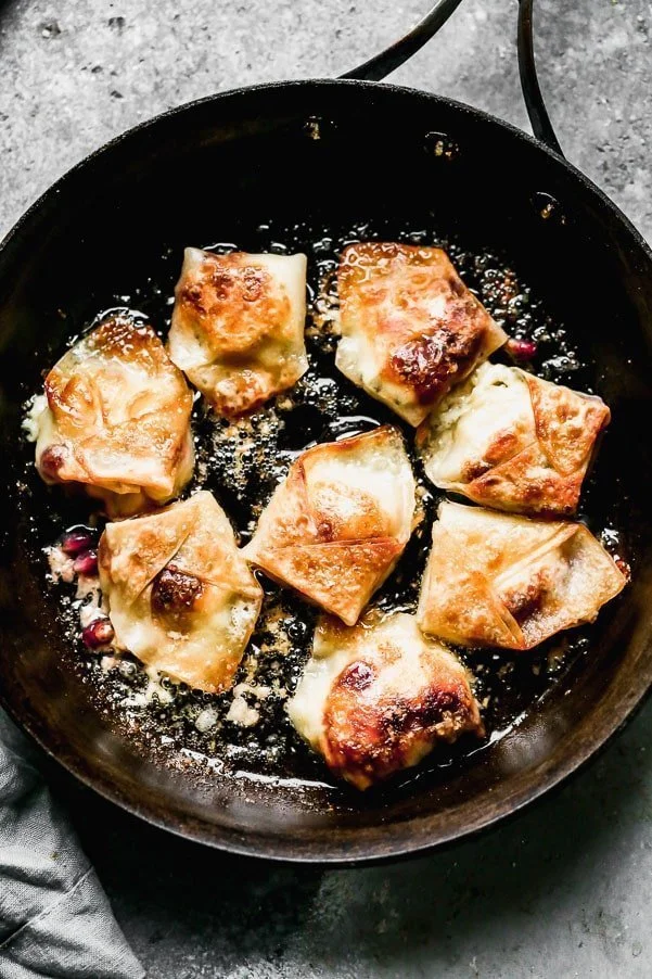 Brown potstickers in canola or olive oil