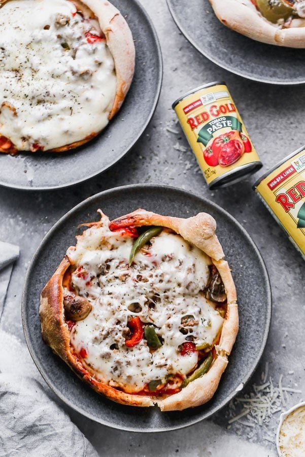 Our Supreme Pizza Pot Pies are a weeknight dream! We take all of the ingredients of a classic supreme pizza, pile them into a bowl filled with gooey mozzarella cheese, cover with store-bought pizza crust and bake until the crust is golden and the inside is melty and piping hot! Customize each pie exactly how you want to suit all taste buds, big and small. 