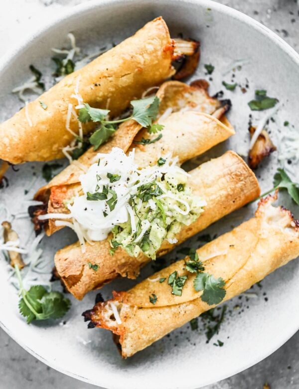 Irresistibly crispy on the outside and filled with shredded honey lime chicken and plenty of melted monterey jack cheese on the inside, our Air Fryer Taquitos are the perfect Game Day snack. Serve shredded cheese, an easy guac and plenty of lime sour cream to finish them off. 