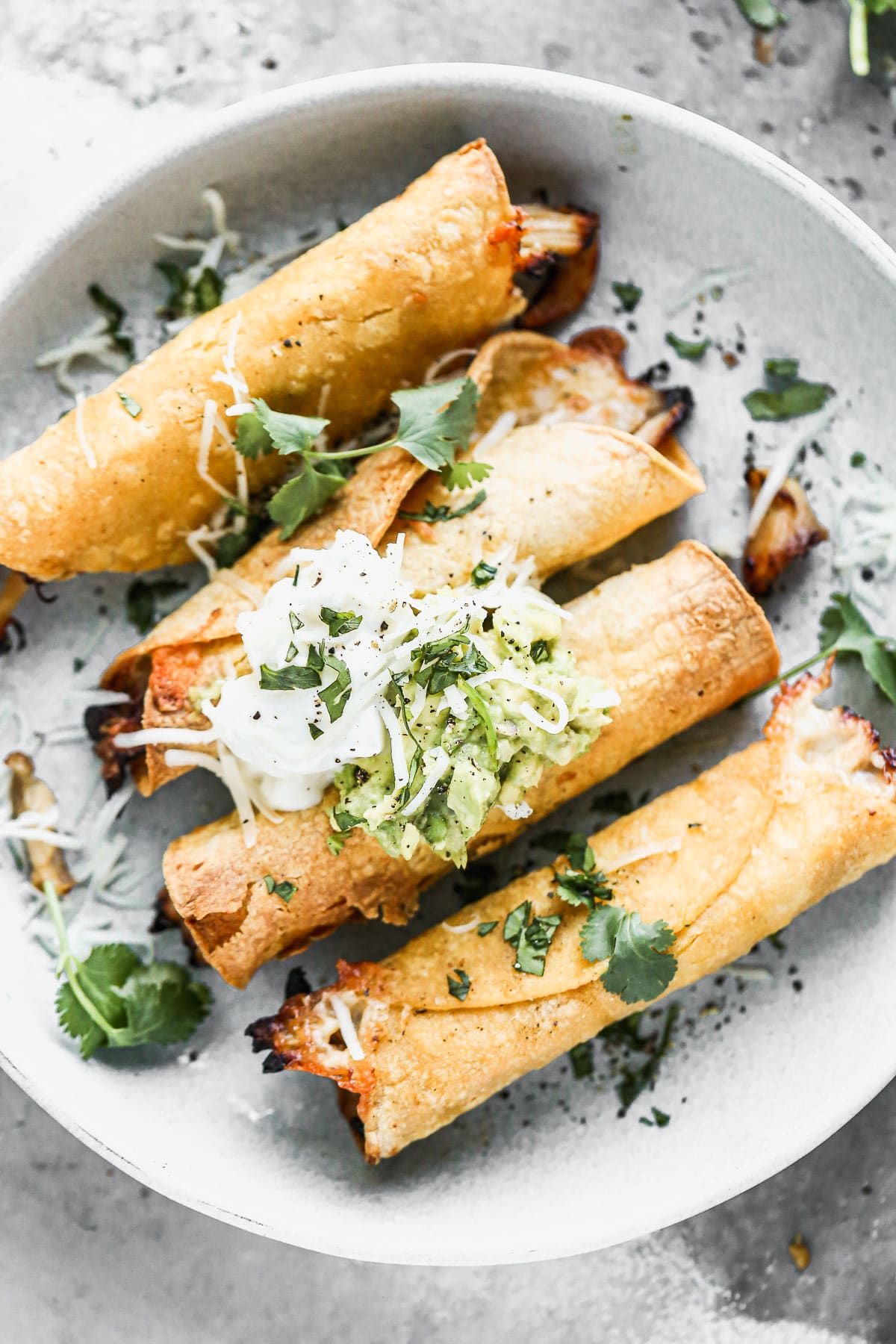 Irresistibly crispy on the outside and filled with shredded honey lime chicken and plenty of melted monterey jack cheese on the inside, our Air Fryer Taquitos are the perfect Game Day snack. Serve shredded cheese, an easy guac and plenty of lime sour cream to finish them off. 