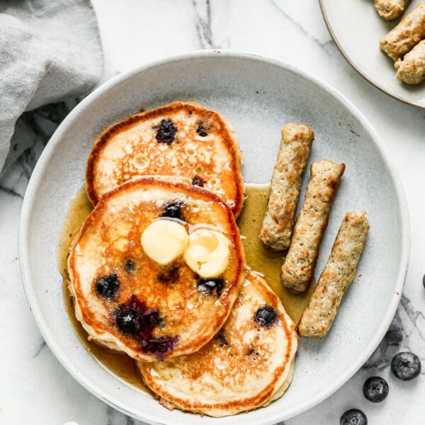 Crispy on the outside, fluffy on the inside and full of tanginess is means these are the best Blueberry Buttermilk Pancakes on the planet!
