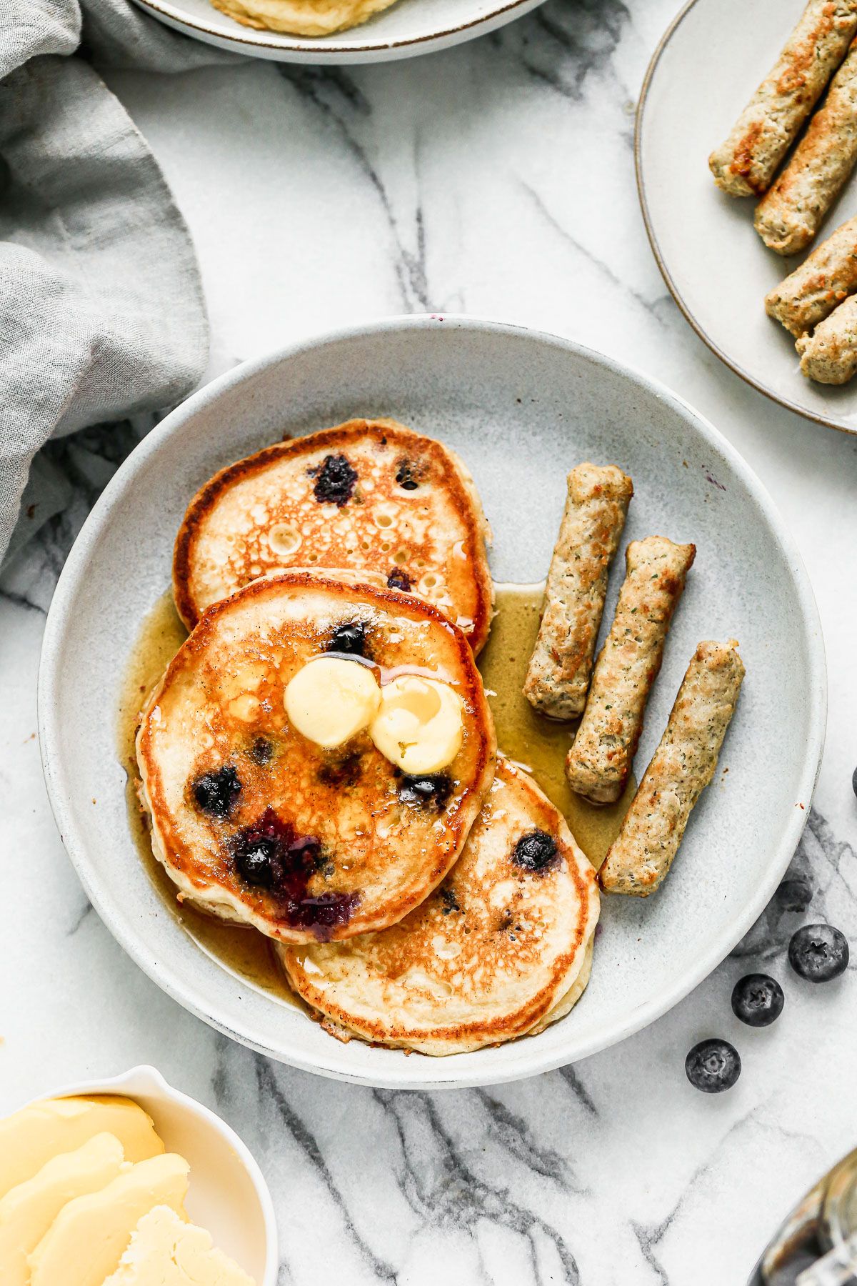 Crispy on the outside, fluffy on the inside and full of tanginess is means these are the best Blueberry Buttermilk Pancakes on the planet! 