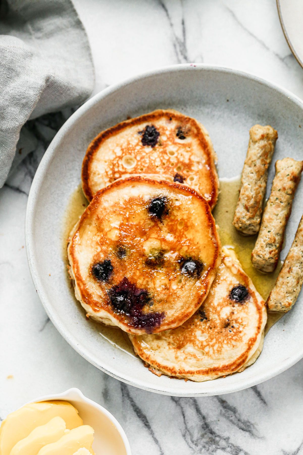 Crispy on the outside, fluffy on the inside and full of tanginess is means these are the best Blueberry Buttermilk Pancakes on the planet! 