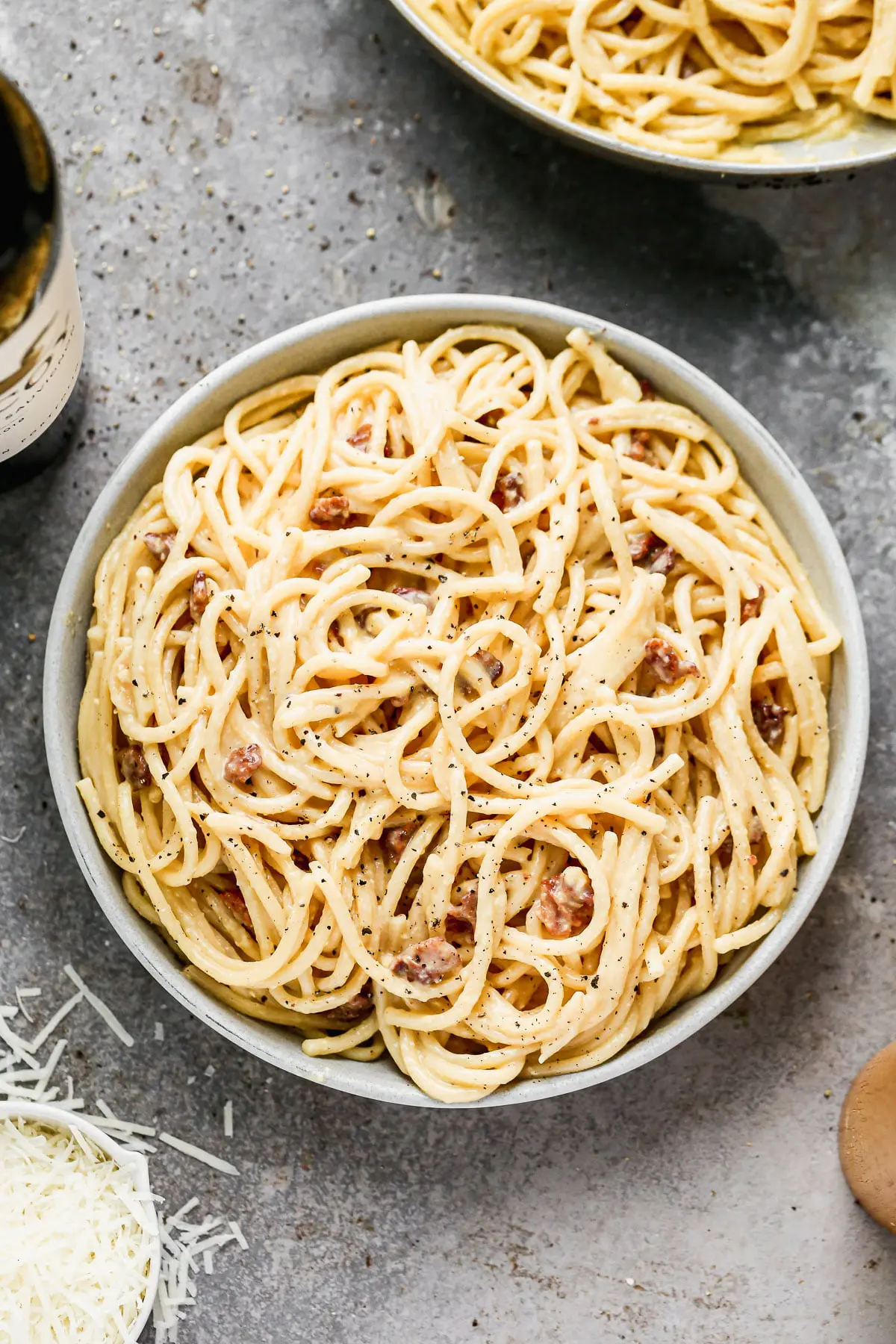 Silky-smooth noodles twirled in a rich, creamy (but cream-less) sauce, nutty pecorino cheese, and bits of salty bacon, our Bucatini Carbonara is the ultimate in Italian comfort food and arguably, the simplest. &nbsp;Our version amps up the amount of both cheese and bacon, adds in a little bit of garlic, and swaps out classic spaghetti for thick bucatini noodles.
