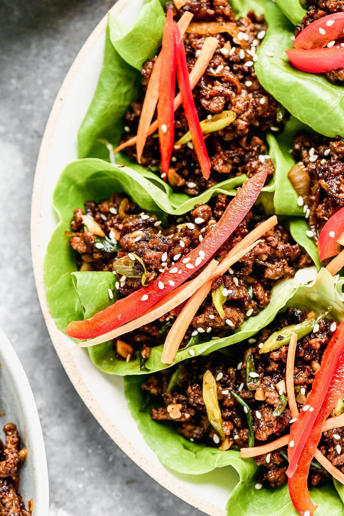 Ultra crispy and smothered in a soy-based sauce studded with rich brown sugar, sweet mirin wine, and brimming with heat from Sambal Oelek, these Beef Lettuce Wraps are my new favorite way to do lettuce. With easy-to-find ingredients, and minimal prep and cook time, they're also the perfect way to get dinner on the table without &nbsp;much effort.&nbsp;