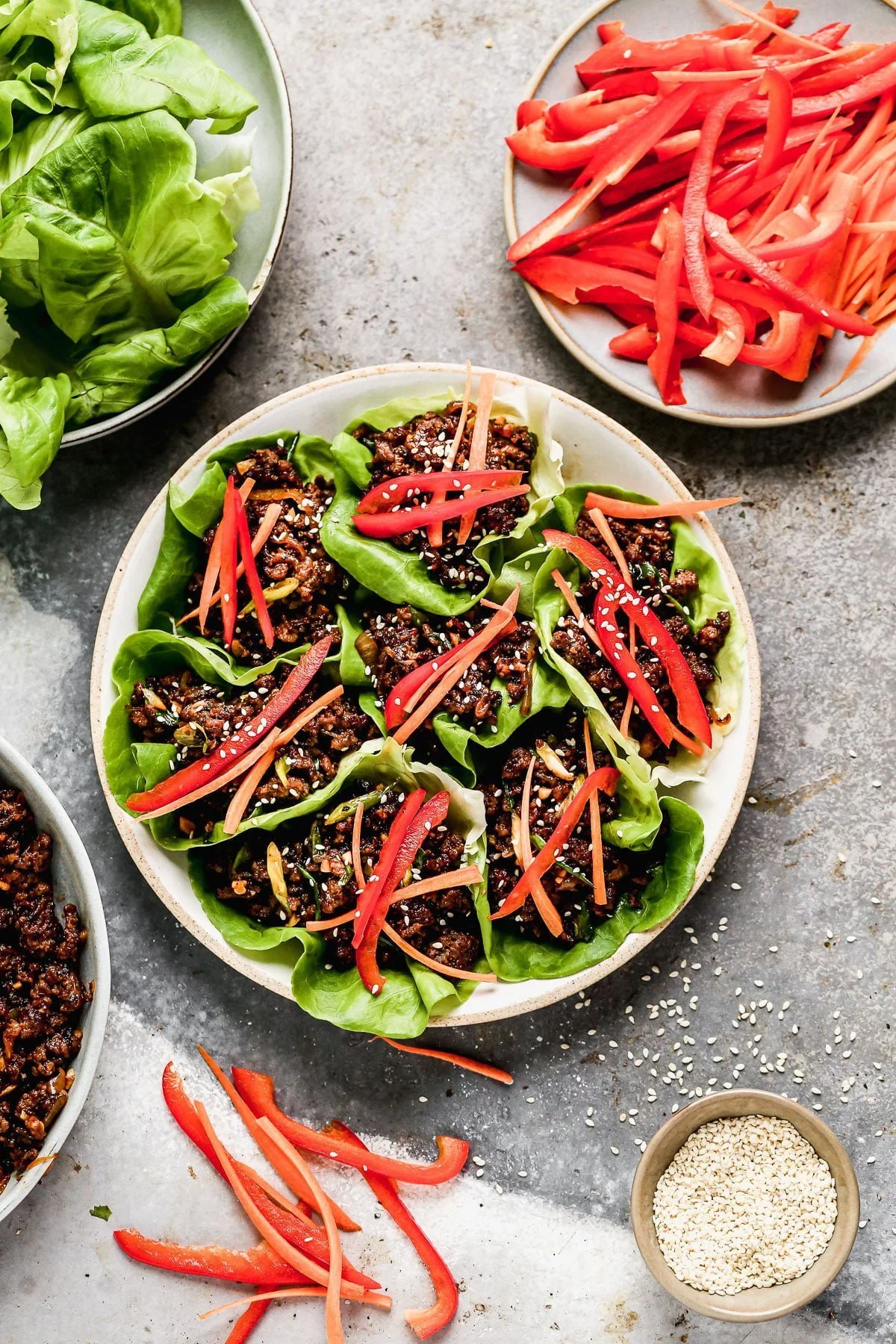 Ultra crispy and smothered in a soy-based sauce studded with rich brown sugar, sweet mirin wine, and brimming with heat from Sambal Oelek, these Beef Lettuce Wraps are my new favorite way to do lettuce. With easy-to-find ingredients, and minimal prep and cook time, they're also the perfect way to get dinner on the table without &nbsp;much effort.&nbsp;