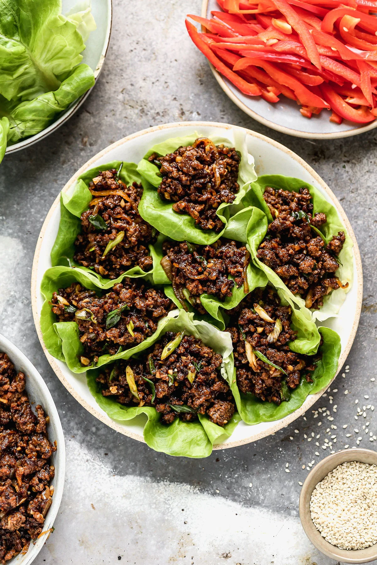 Ultra crispy and smothered in a soy-based sauce studded with rich brown sugar, sweet mirin wine, and brimming with heat from Sambal Oelek, these Beef Lettuce Wraps are my new favorite way to do lettuce. With easy-to-find ingredients, and minimal prep and cook time, they're also the perfect way to get dinner on the table without &nbsp;much effort.&nbsp;