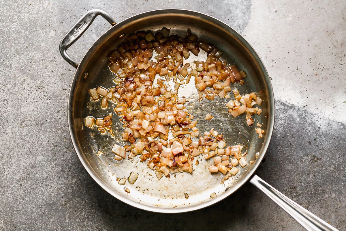 Shallots sweating in oil. 