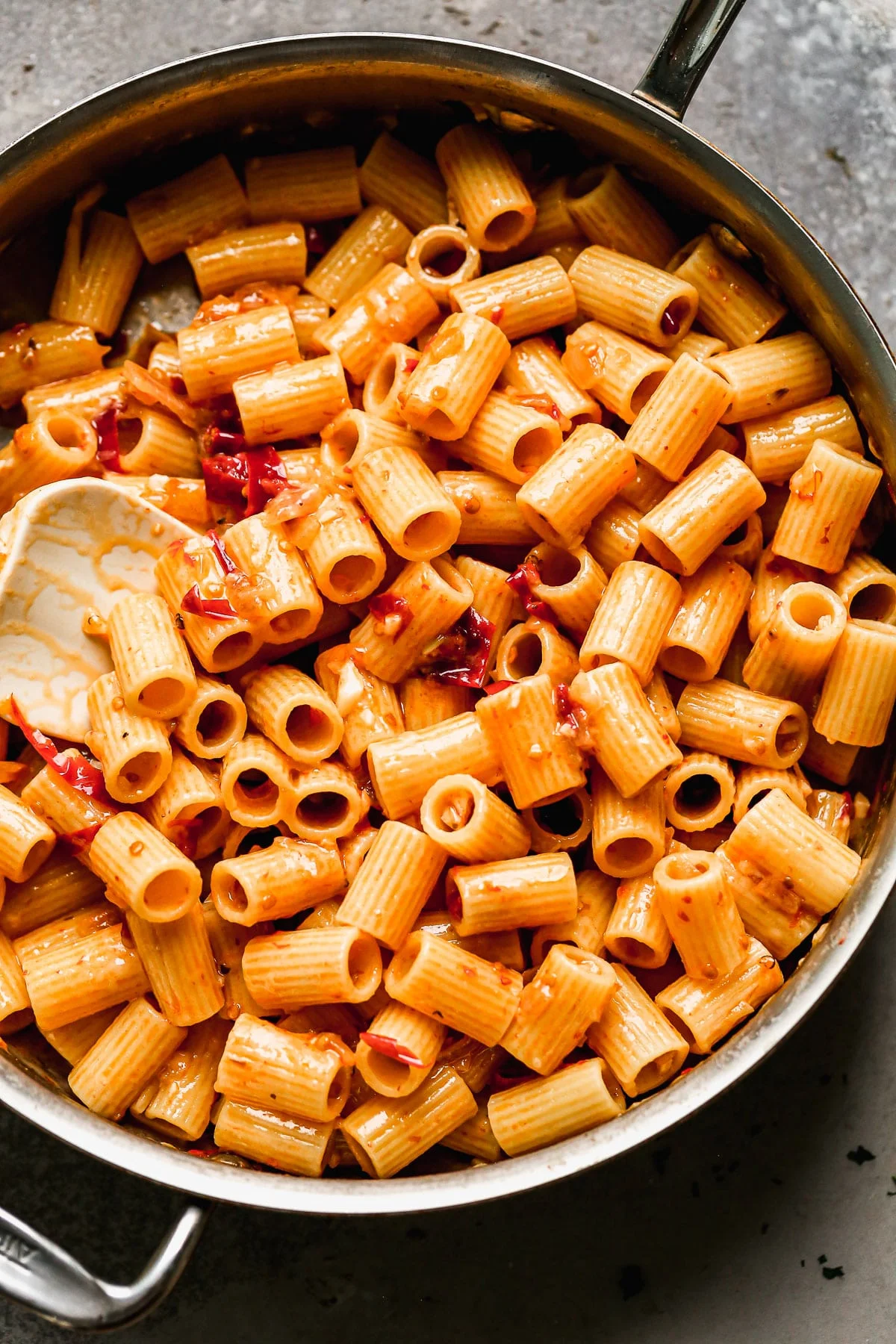 Toss rigatoni with chilis, shallots, and garlic. 