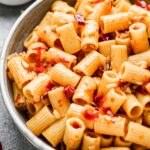 There are fewer thing in life that give me more pleasure than a simple aldente pasta with plenty of heat, a heavy hand of nutty parmesan cheese, and an obscene amount of garlic. When that pasta comes together in under 30 minutes, and uses a mere six ingredients, we're pretty much inseparable from now to eternity.  