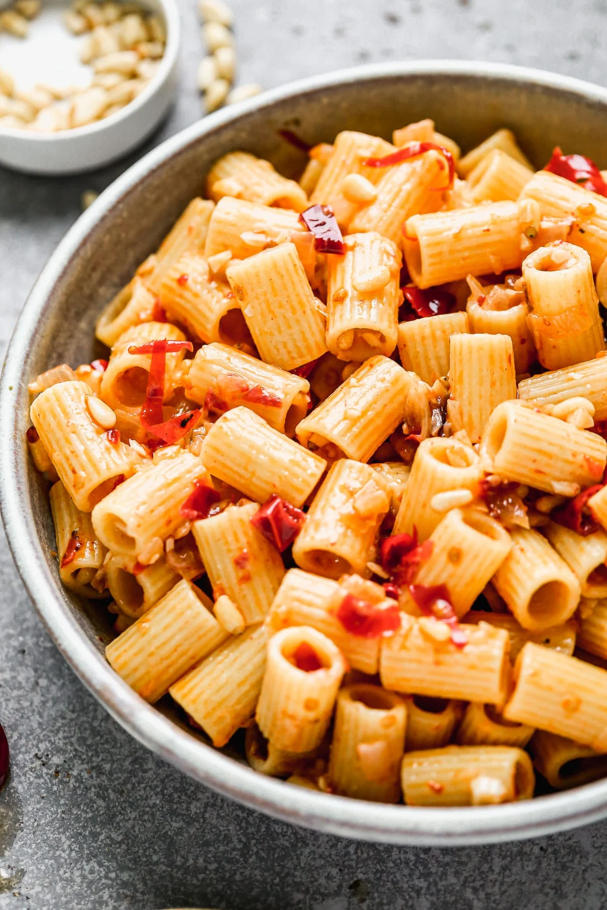 There are fewer thing in life that give me more pleasure than a simple aldente pasta with plenty of heat, a heavy hand of nutty parmesan cheese, and an obscene amount of garlic. When that pasta comes together in under 30 minutes, and uses a mere six ingredients, we're pretty much inseparable from now to eternity. &nbsp;