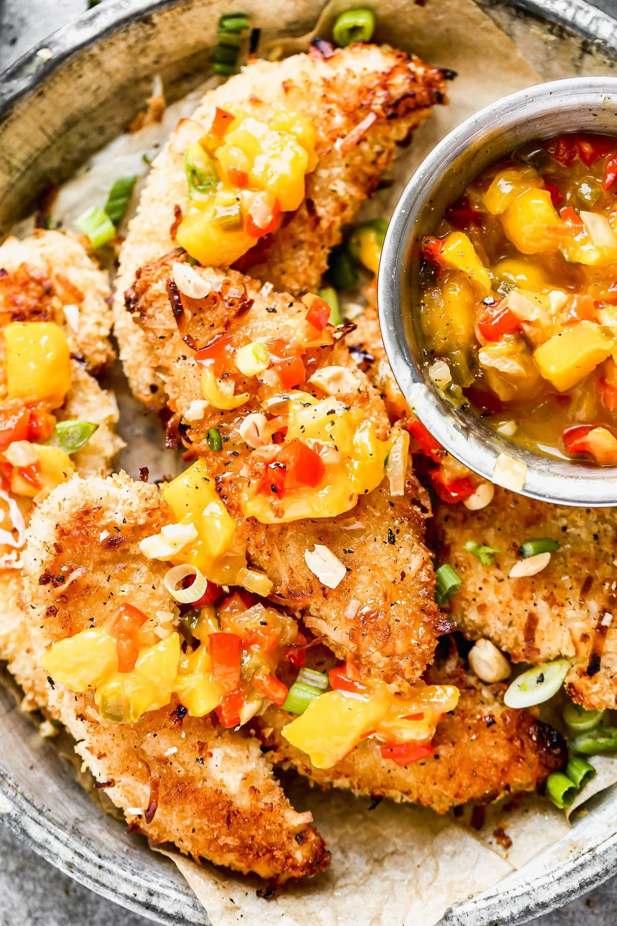 Crispy Baked Coconut Chicken Tenders with Warm Mango Salsa and Hot Honey Drizzle