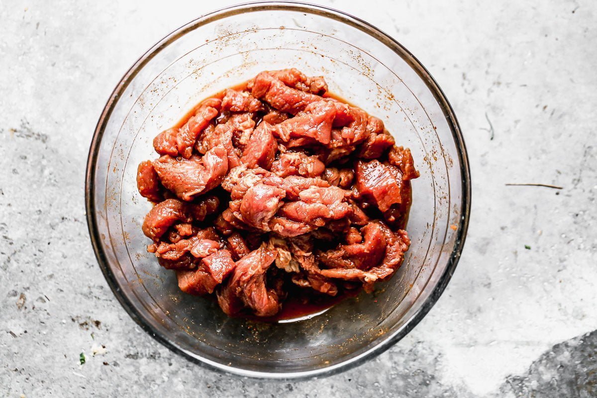 Marinate pork tenderloin in soy sauce, lime juice, and honey.